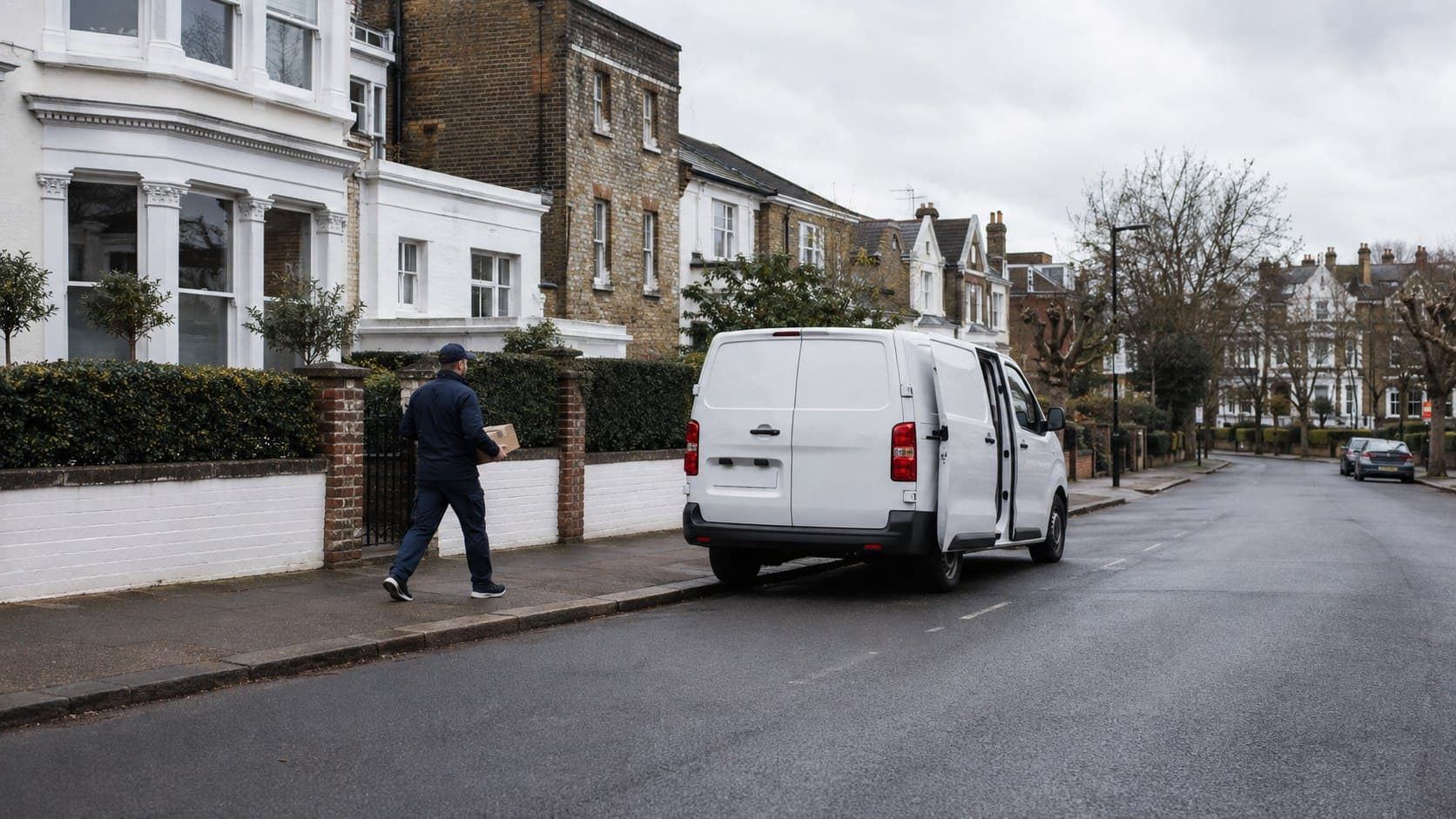 Unbranded courier collecting a prepared consignment in Harold Park, shown in a residential pocket on the eastern edge of Harold Wood close to Essex-bound routes.