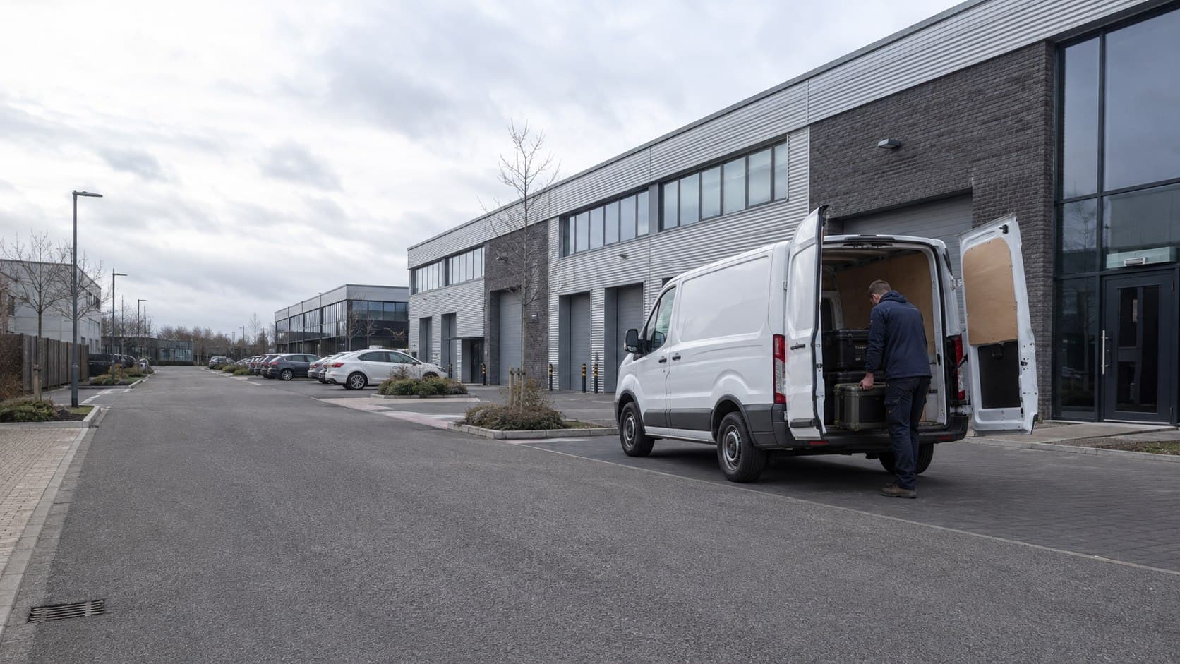 Unbranded courier collecting a prepared consignment in Harold Wood, shown in an eastern Havering district with homes, local firms and quick links beyond Greater London.