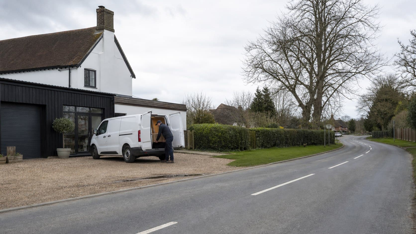 Unbranded courier collecting a prepared consignment in Havering-atte-Bower, shown in a village-edge part of northern Havering with dispersed properties and rural approaches.